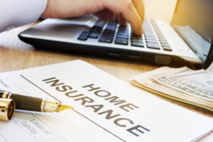 Home insurance form on a table in an agency.